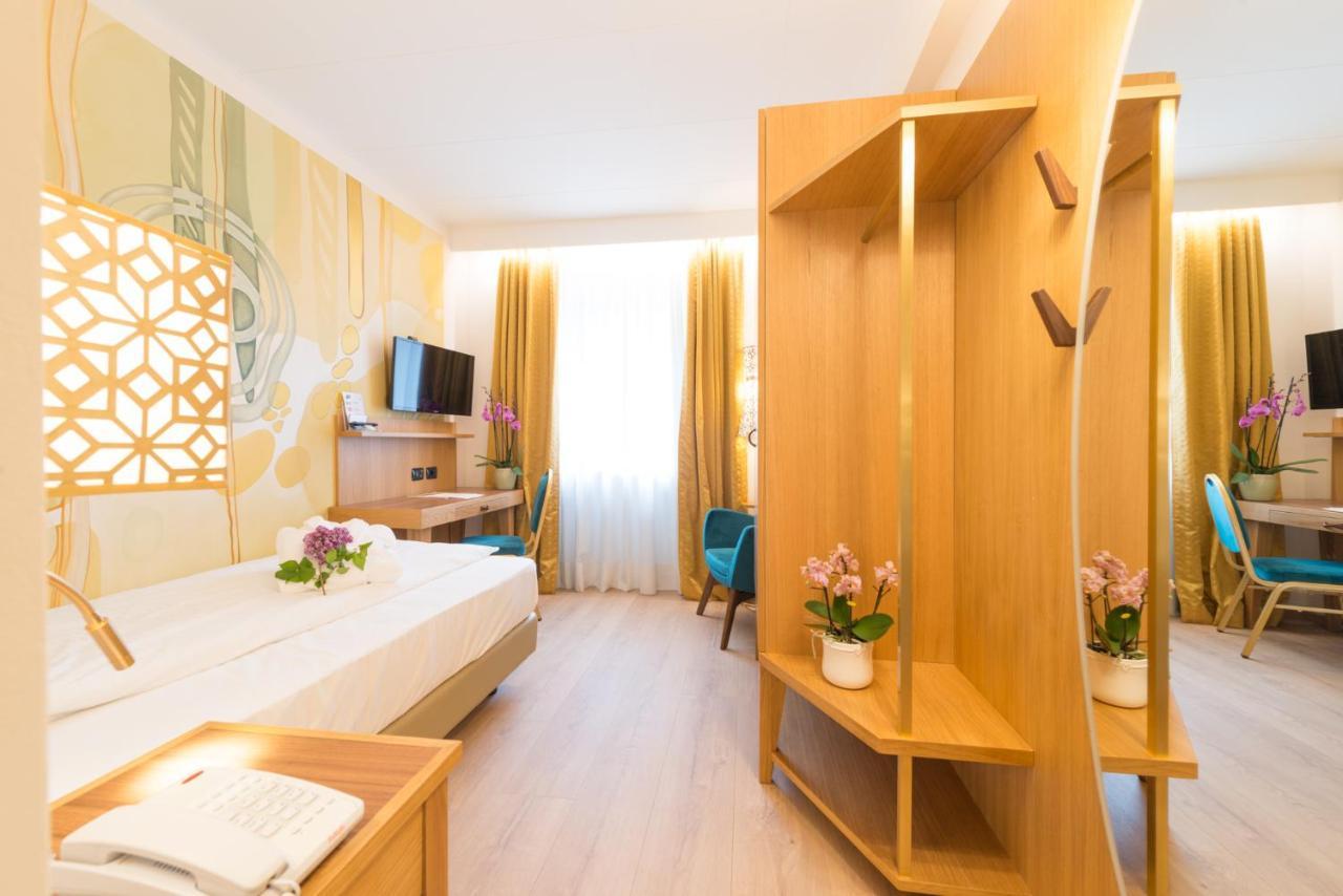 Hotel Eden Левико Терме Екстериор снимка